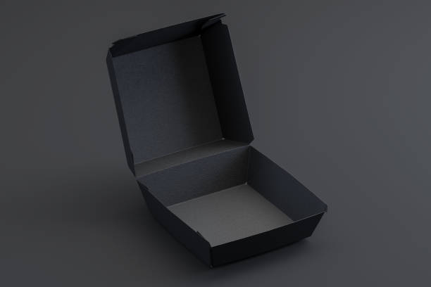 istock Blank Black Cardboard Box on Black Background. Packaging Template. Mock up. Copy space. Empty Space. 3d rendering 1267196234