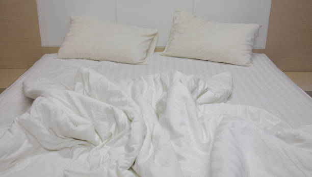 istock The empty bed and disordered sheets give comfort to those who sleep, and rush out and start the day as soon as they wake up. 1267196707