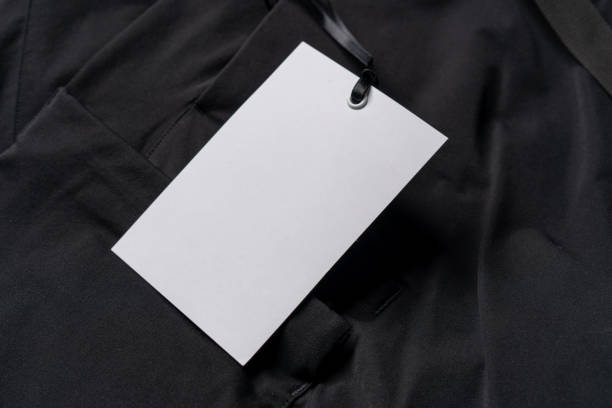 istock Blank White Rectangular Clothing Tag, Label Mockup Template on Stylish Sportswear. Price Tag Label With Copy Space, Empty Space 1267197705