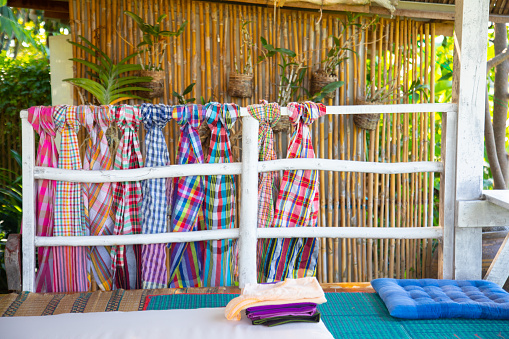 Loincloths are used for bathing and towels of rural people in asian countries, especially Thailand. There are many patterns, which the villagers will hang and tie on the house.