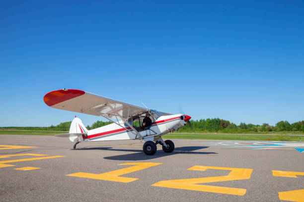 istock Pilot in small single engine plane taxis toward runway for take off 1267208339