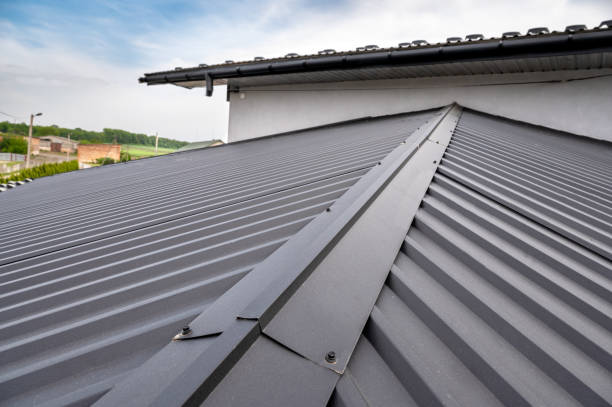 . Gutter system for a metal roof. Holder gutter drainage system on the roof.