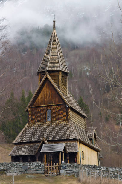 Exterior of Urnes Stave church overlooking the Sognefjord. Built in 1150, Urnes is the only stave church designated as a UNESCO World Heritage site. Luster village,  Norway.