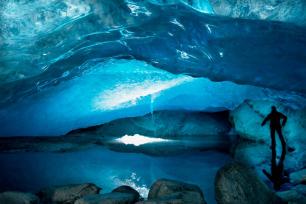 Rounded tunnel ice cave view from the inside. Cueva de Jimbo, Ushuaia, Tierra del Fuego. High quality photo