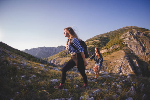 istock Two Girls in Nature 1267230458