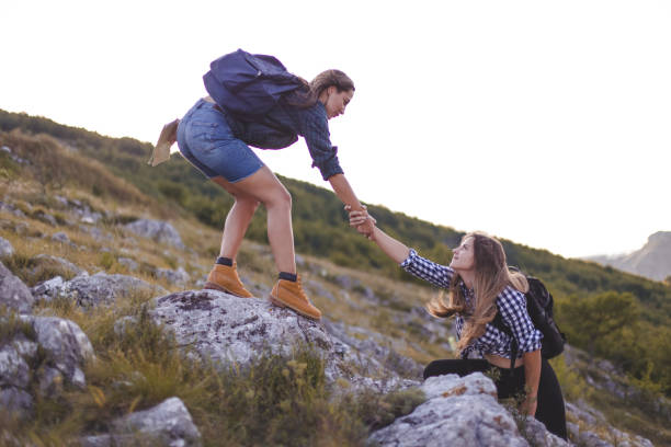 istock Two Girls Hiking 1267230520