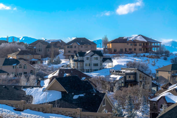 istock Pristine Wasatch Mountain landscape with houses on sweeping snowy terrain 1267231346