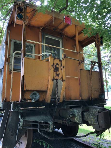 istock Behind of rusty abandoned train carriage with dirty windows 1267236471