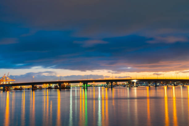 tauranga  harbour bridge lights and reflections before sunrise - tauranga imagens e fotografias de stock