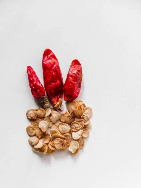Photo of dried chilli arrangement on table