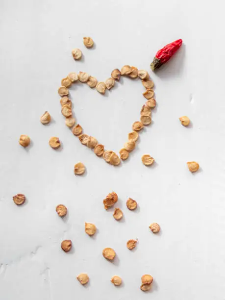 Photo of dried chilli and seeds top view