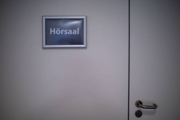 istock on grey sign with white letters Lecture hall 1267252615