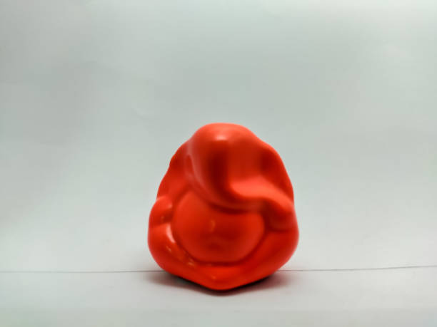 istock orange statue of god ganesh on a white isolated background 1267252871