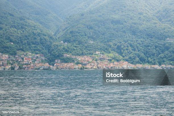 Panorama At Lake Como Lezzeno Town On Background Hills Covered Green Forest Stock Photo - Download Image Now