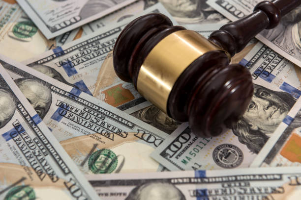 istock Gavel judge on us money dollars banknotes 1267269362