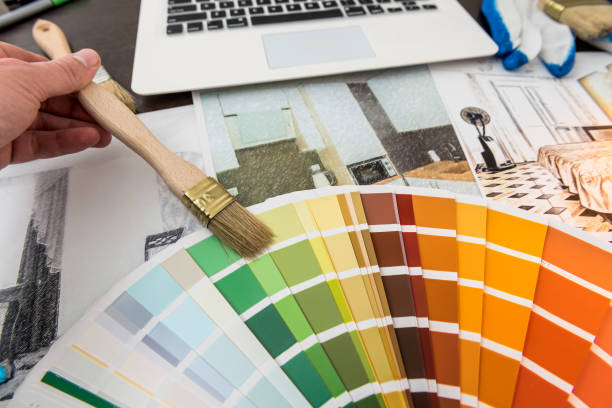 istock Man work with Color palette and house apartament sketch for creative design home 1267270920
