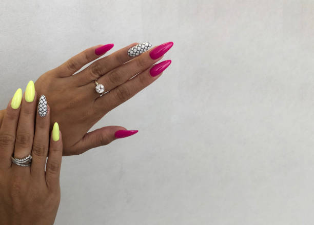 istock Bright multi-colored design of manicure.Multicolored manicure close up 1267271855