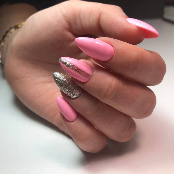 istock Bright multi-colored design of manicure.Multicolored manicure close up 1267271931