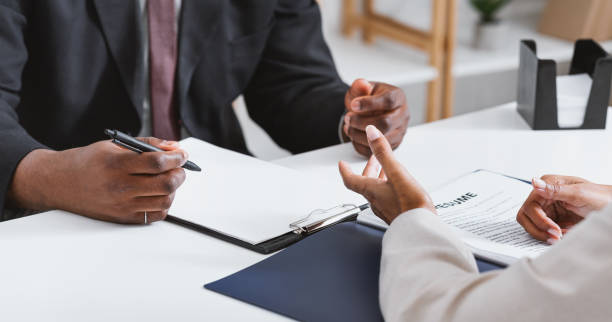 istock Unrecognizable HR manager interviewing potential employee at office, close up view 1267273238