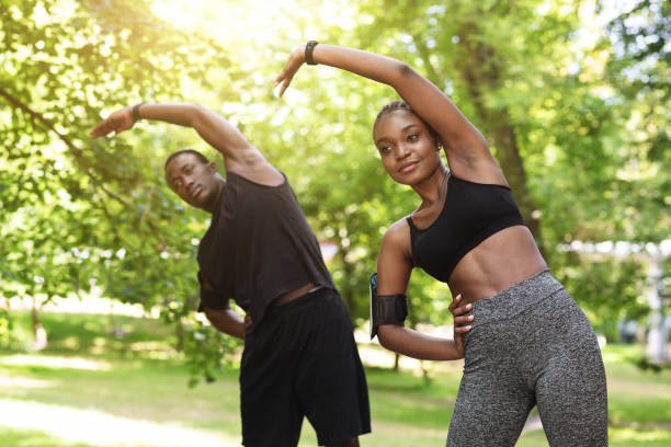 Outdoor Training Athletic Black Couple Doing Sport Exercises Together In  Park Stock Photo - Download Image Now - iStock