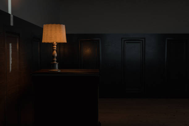 istock 3d rendering of classic room at night with illuminated bedside lamp and light gap from moonlight 1267274694