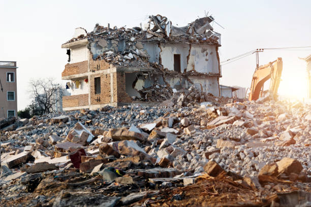 istock Construction machinery working on house demolition site 1267275835