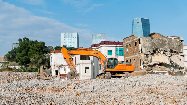istock Construction machinery is demolishing the house 1267275989