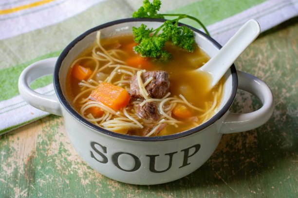 Noodle soup with beef meat fresh and homemade noodle soup with tender beef meat cooked with beef shanks and marrow bone - ready to eat noodle soup photos stock pictures, royalty-free photos & images