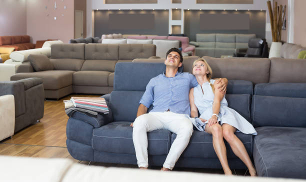istock couple who are choosing sofa-transformer 1267277868