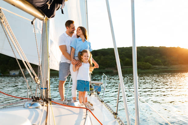 istock Family Spending Summer Sailing On Yacht, Posing Standing On Deck 1267278705