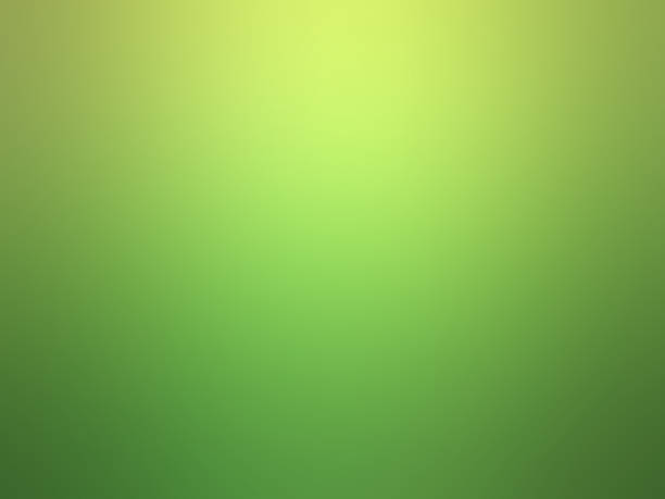 istock Abstract background, shimmering in a yellow and green color gradient with a spotlight. 1267278707