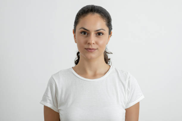 istock Young woman looking at camera 1267278710