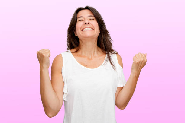 istock Attractive Spanish middle-aged brunette woman making expressive gestures. Success, everything ok, everything works fine. Positivity 1267278752