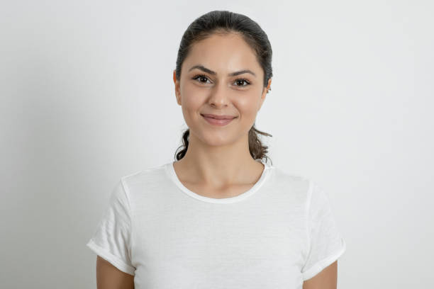 istock Young woman looking at camera 1267278786
