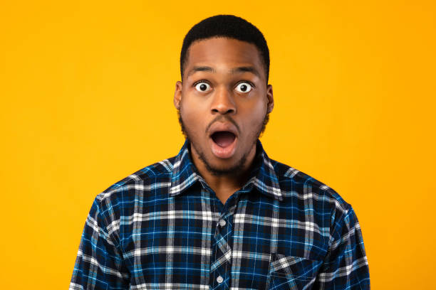 istock Shocked African Man Looking At Camera In Amazement, Studio Shot 1267278946