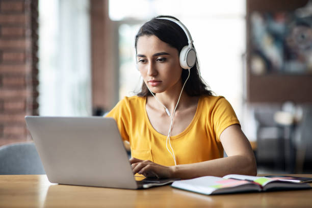 istock Concentrated arab girl typing on keyboard, studying online 1267279126