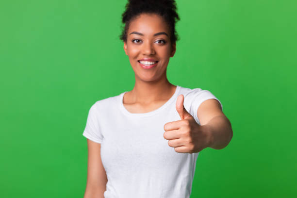 istock Afro lady showing thumb up at studio 1267279933