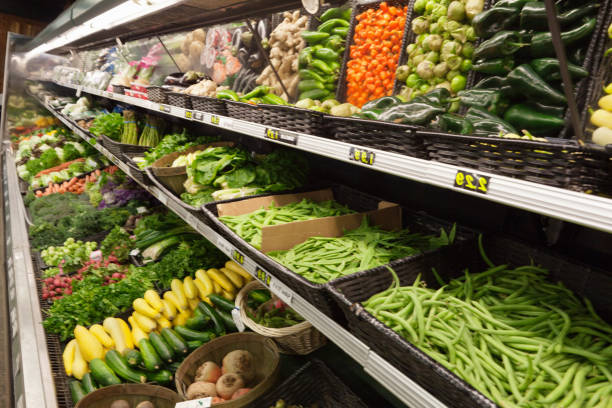 istock Fresh vegetables on display in farmer's market 1267281479