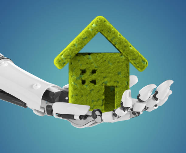 istock Robotic hand holding a green house 1267283091
