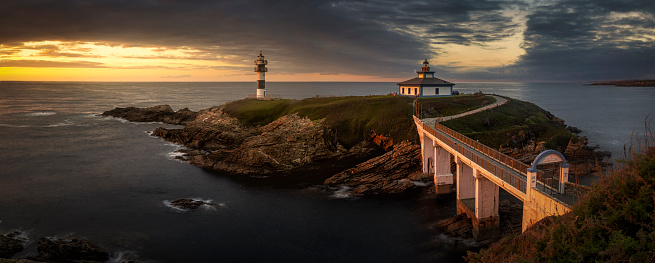 Panoramic view it the lighthouse at Illa Pancha in the north coast of Spain