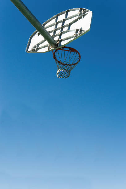 istock Low angled view of a basket ball net and hoop and backboard 1267285731