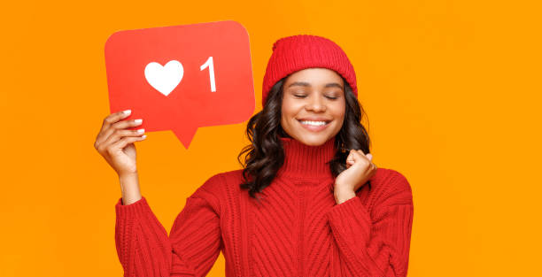 istock Ethnic female making wish in social media 1267289385