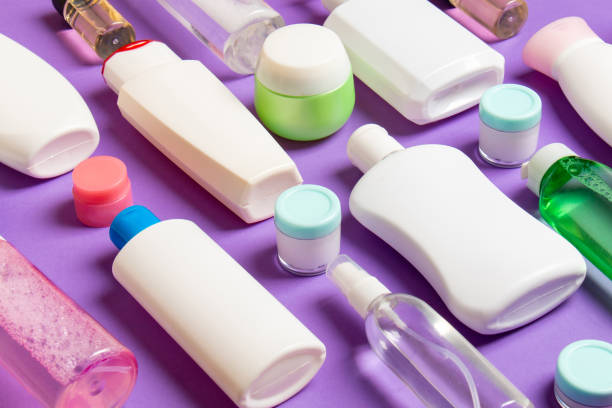 istock Group of plastic bodycare bottle Flat lay composition with cosmetic products on colored background empty space for you design. Set of White Cosmetic containers, top view with copy space 1267292042