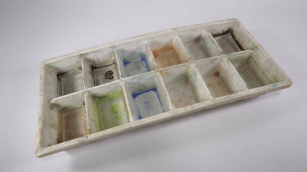 istock Ice cube tray as watercolor palette on white background 1267292885