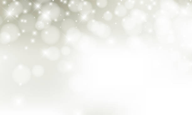 istock Christmas background with blur golden lights with snowflakes. 1267293001