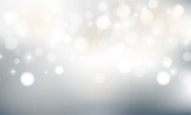 istock Christmas background with blur golden lights with snowflakes. 1267293021