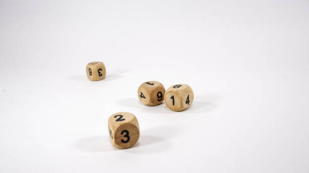 istock Wooden dice on white background 1267293533