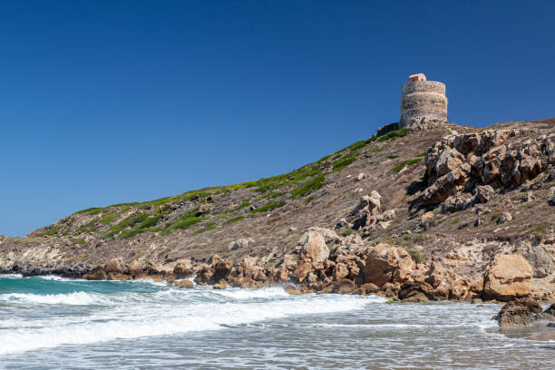 istock Capo San Marco beach with coastal tower, Cabras, Sardinia, Italy 1267295375