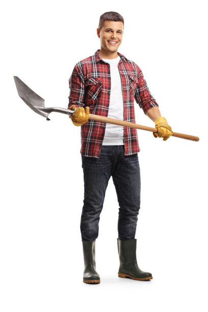 istock Male gardener in boots holding a shovel 1267296918