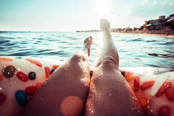 istock Inflatable ring donut from first person perspective 1267298803